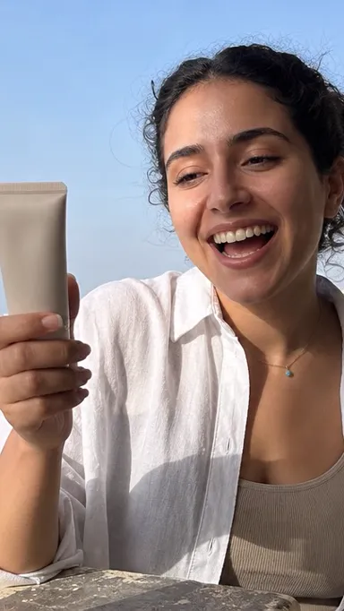 Masri creator filming a skincare tube in Alexandria